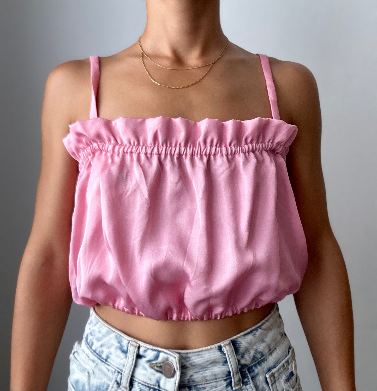 Pink ruffled top