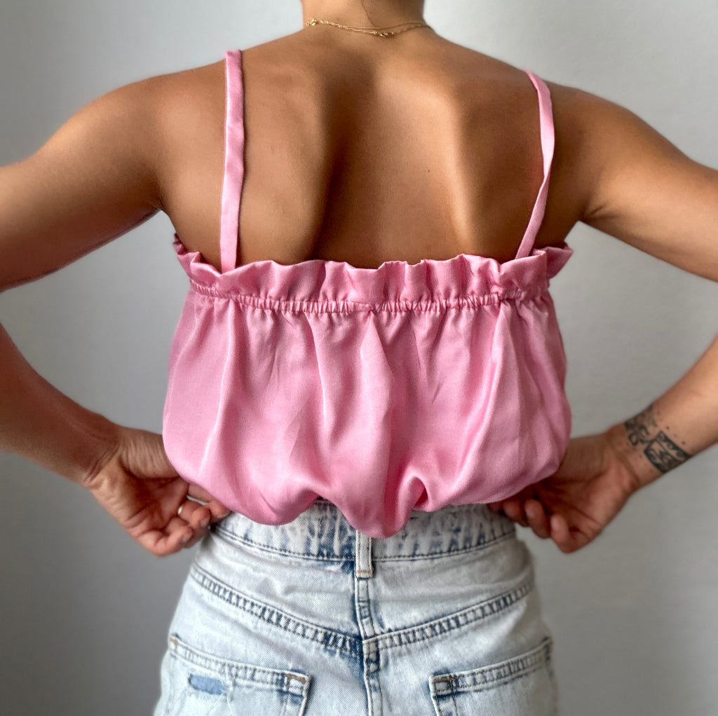 Pink ruffled top